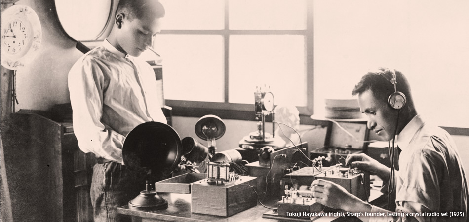 Tokuji Hayakawa (right), Sharp’s founder, testing a crystal radio set (1925) 